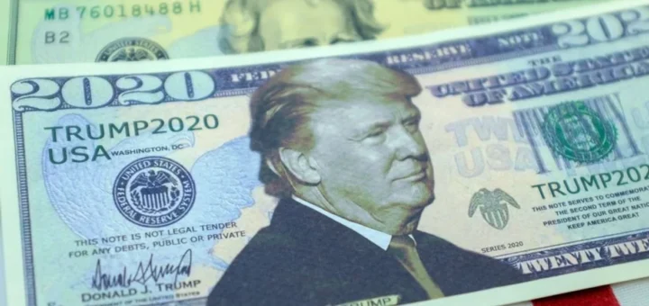 a fake $2020 bill featuring former President Donald Trump. Photo illustration: Christopher Sciacca/Shutterstock