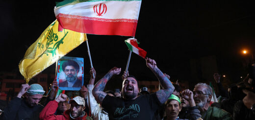 Iranians react after a ceasefire announcement at the Enqelab square, in Tehran, on April 8 2026.